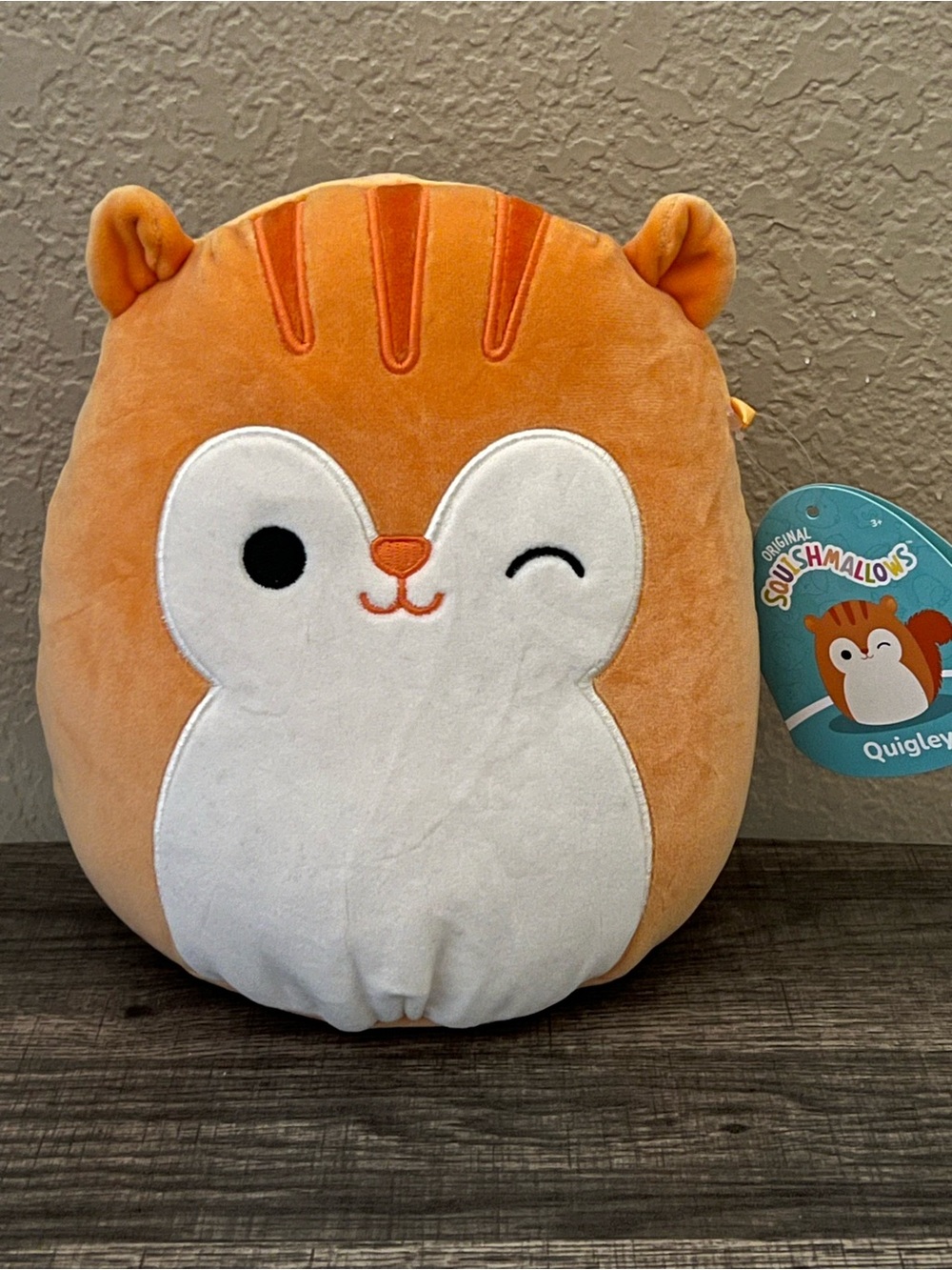 Squishmallows Orange and White Quigley Plush